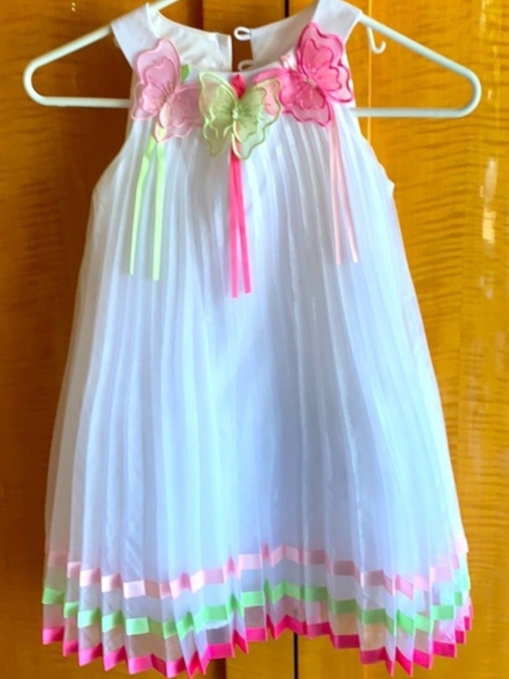 White Pleated Girls Dress with Neon Butterfly Trim